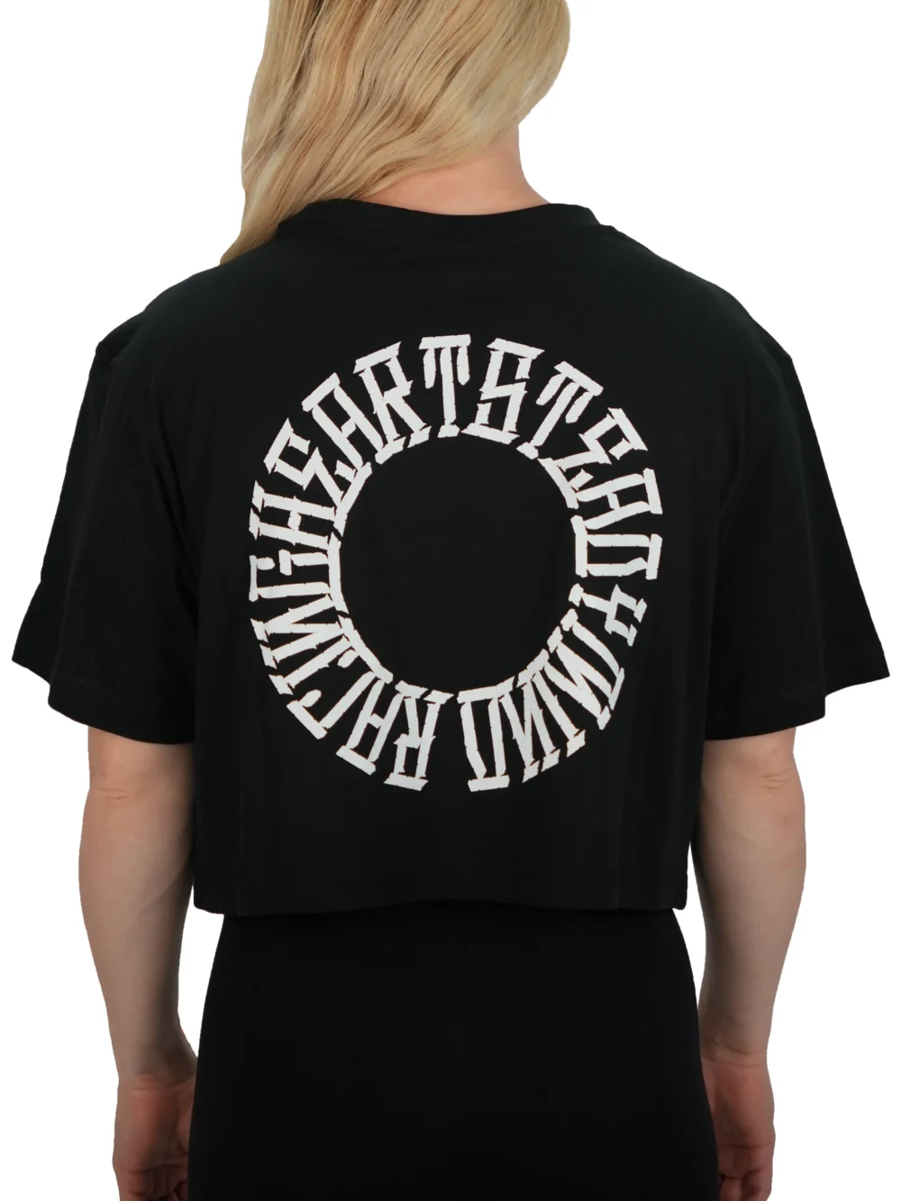 Model showing the back of the black oversized tee, highlighting the "Racing Heart Steady Mind" graphic on the premium RHSM workout gear.