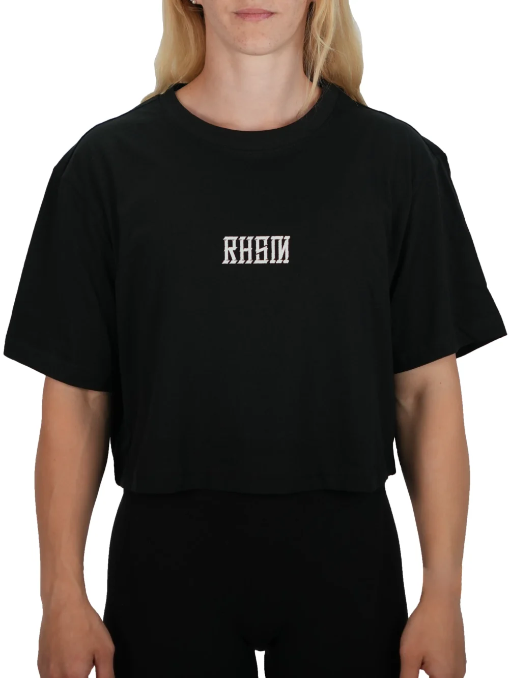 Model wearing the black RHSM 1st Edition oversized tee, demonstrating the athletic oversized fit of the fitness apparel.