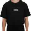 Model wearing the black RHSM 1st Edition oversized tee, demonstrating the athletic oversized fit of the fitness apparel.