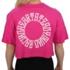 Model showing the back of the pink oversized tee, representing the philosophy of the RHSM calisthenics clothing brand.