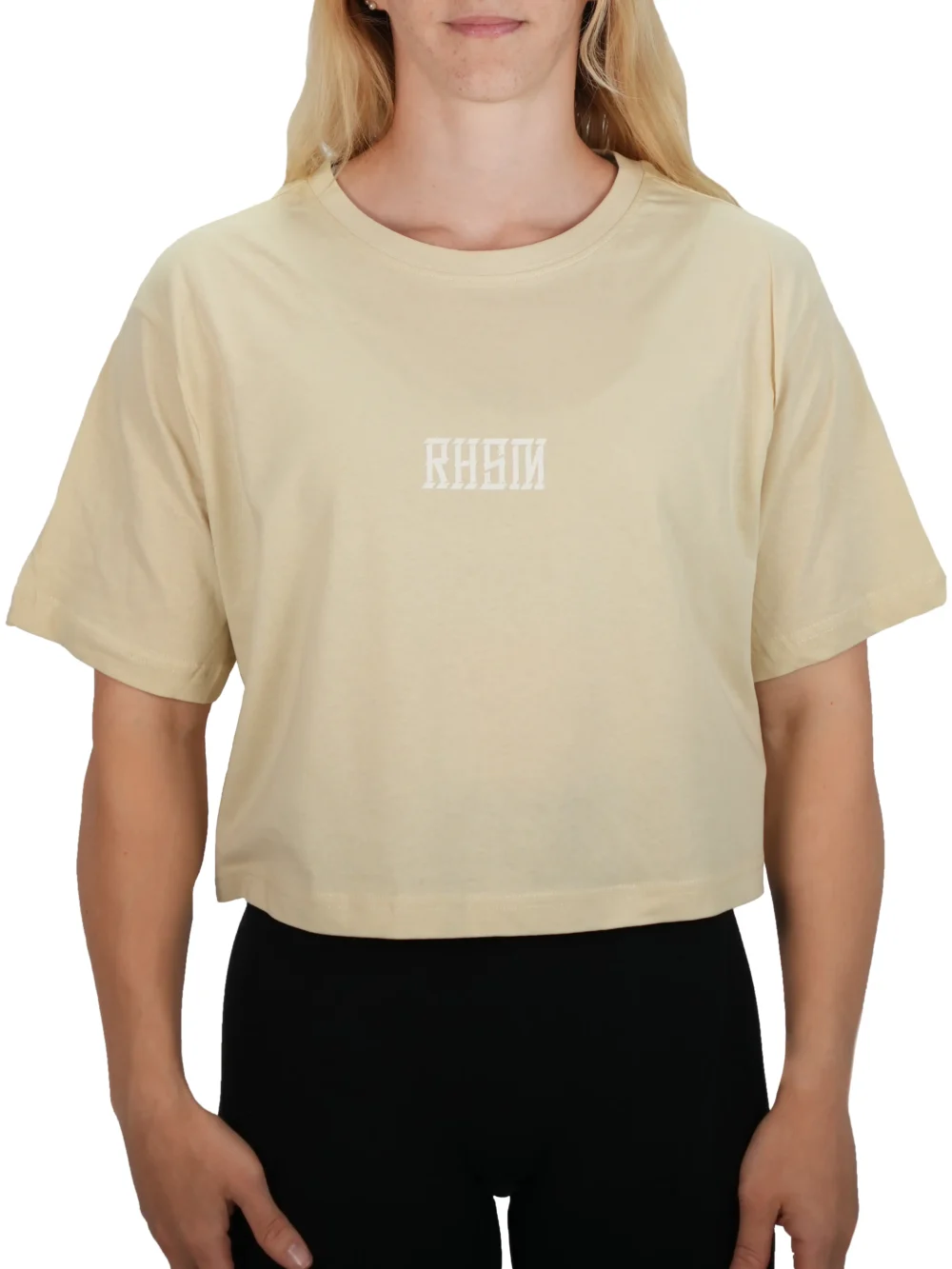 Model wearing the sand RHSM 1st Edition oversized tee, showing the comfortable fit for workout or lifestyle wear.