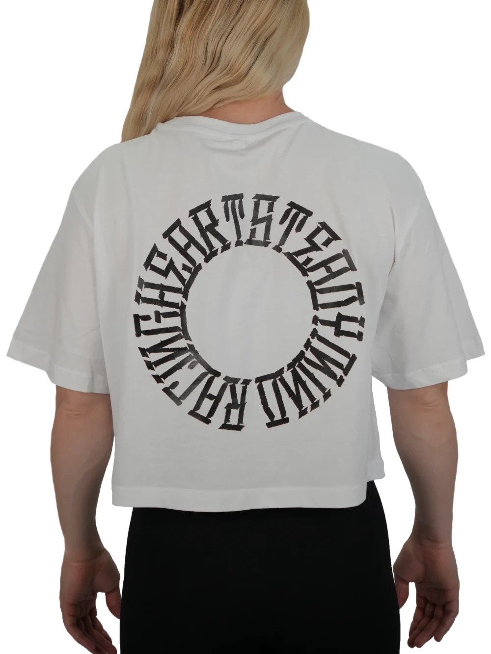 Model wearing the back of the white oversized tee, detailing the statement "Racing Heart Steady Mind" graphic from the RHSM calisthenics clothing brand.