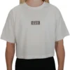 Model wearing the white RHSM 1st Edition oversized tee, demonstrating the modern cut of the women's fitness apparel.