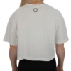 Model wearing the back of the white crop top, representing the lifestyle of the RHSM calisthenics clothing brand.