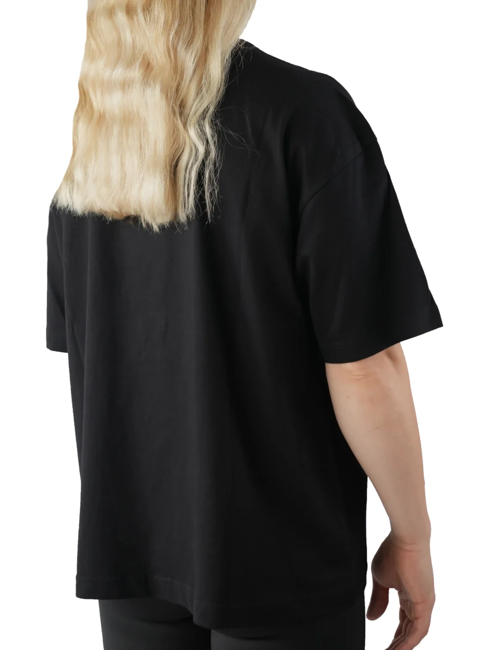 Model showing the drape of the black graphic tee, representing the streetwear style of the RHSM calisthenics clothing brand.