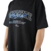 Model wearing the black RHSM Flowstate graphic boxy tee, demonstrating the oversized pump cover fit of the fitness apparel.
