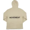 The back of the beige RHSM MVMT Hoodie laid flat, showcasing the minimalist "MOVEMENT" back graphic.