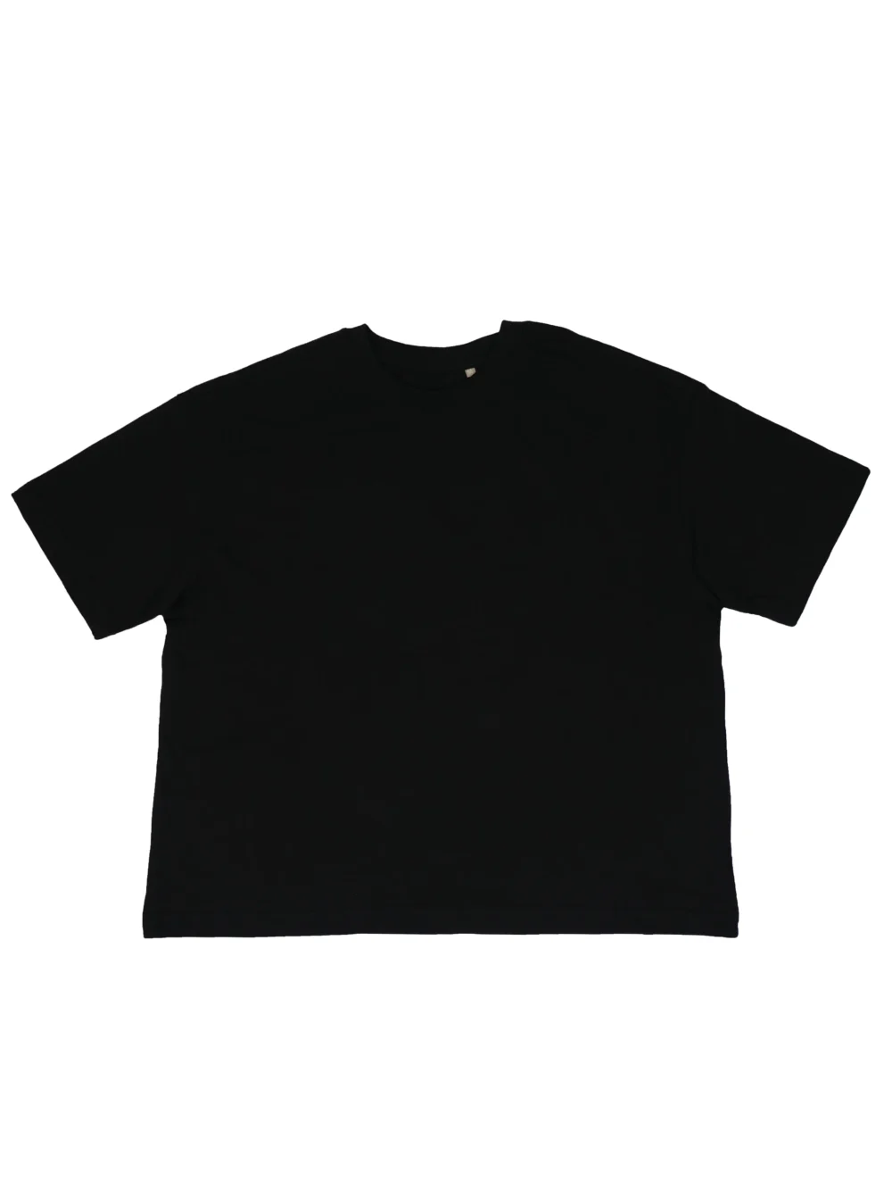 Flat lay of the front of the black RHSM MVMT Oversized Boxy Tee, showing the heavyweight cotton fabric, crewneck, and dropped shoulders.