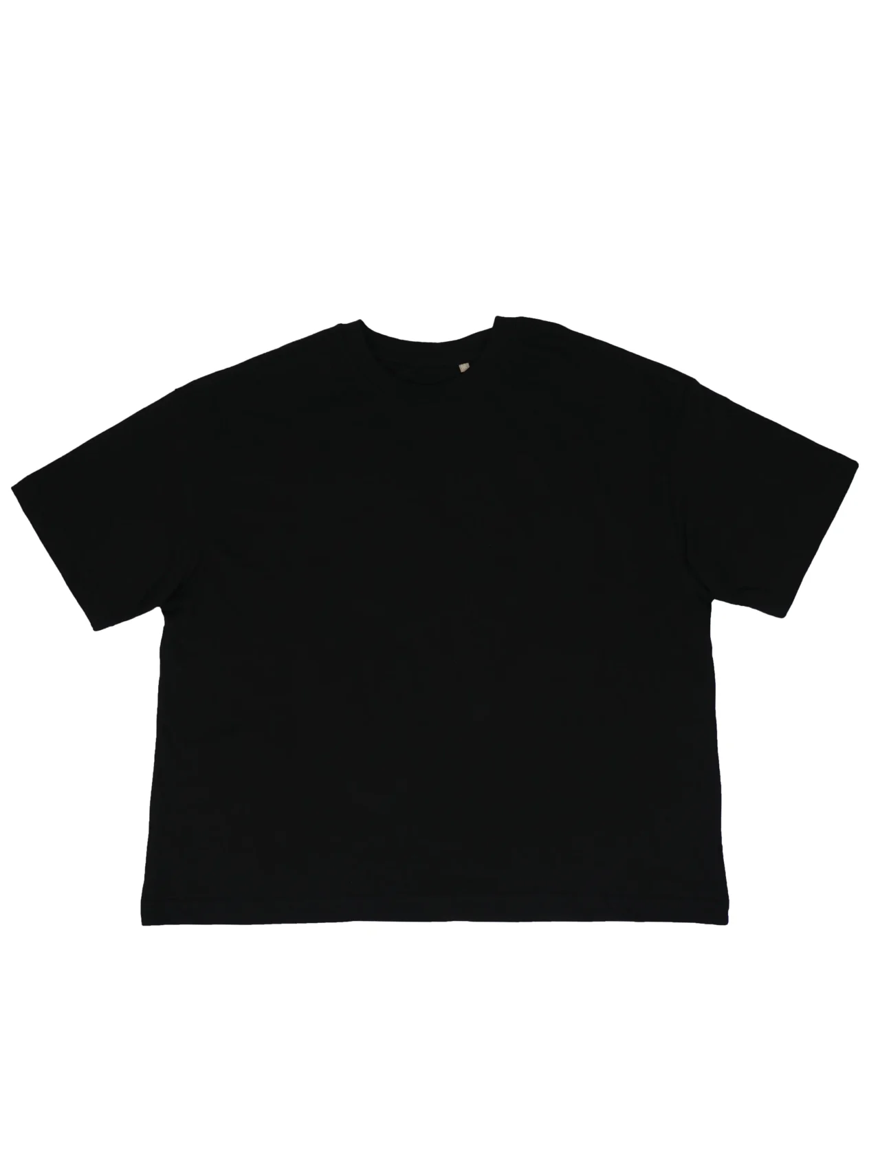 Flat lay of the front of the black RHSM MVMT Oversized Boxy Tee, showing the heavyweight cotton fabric, crewneck, and dropped shoulders.