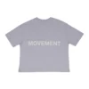 Flat lay of the lilac RHSM MVMT Oversized Boxy Tee, showing the back with the minimalist black "Movement" graphic.