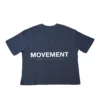 Flat lay of the navy RHSM MVMT Oversized Boxy Tee, showing the back with the minimalist white "Movement" graphic.