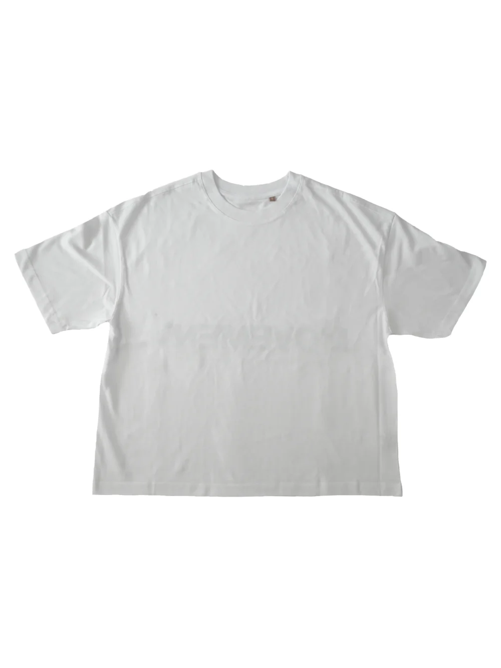 Flat lay of the front of the white RHSM MVMT Oversized Boxy Tee, showing the heavyweight cotton fabric, crewneck, and dropped shoulders.