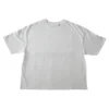 Flat lay of the front of the white RHSM MVMT Oversized Boxy Tee, showing the heavyweight cotton fabric, crewneck, and dropped shoulders.
