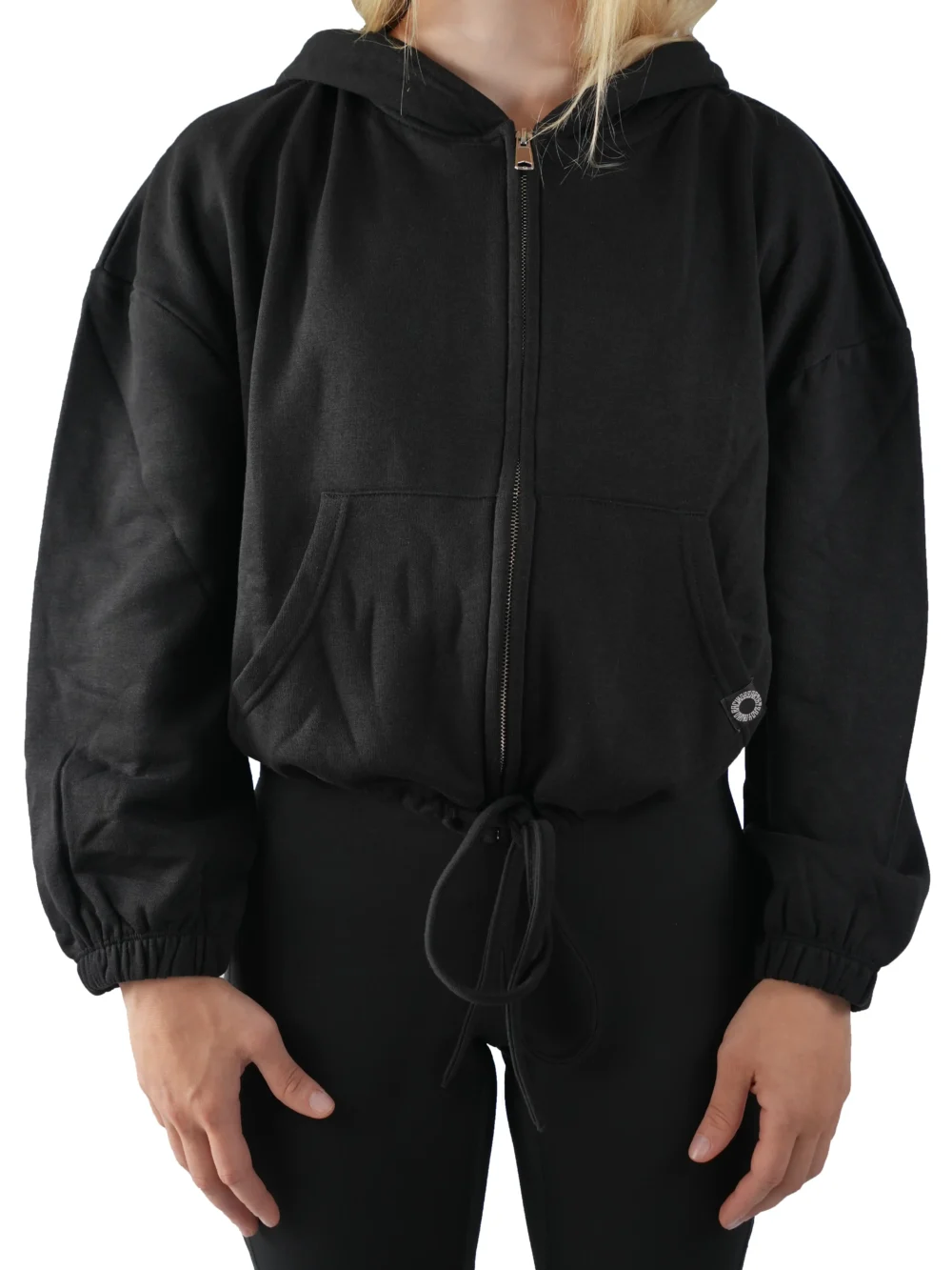 Model wearing the black RHSM Minimalist Full-Zip Hoodie, showing the oversized fit of the fitness apparel.