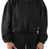 Model wearing the black RHSM Minimalist Full-Zip Hoodie, showing the oversized fit of the fitness apparel.
