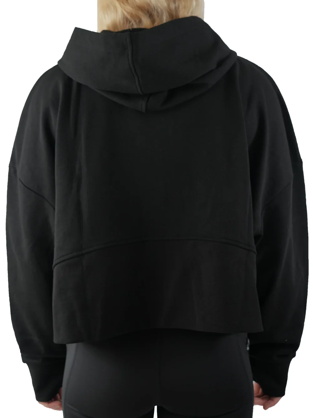 Model wearing the back of the black half-zip hoodie, showing the drape of the lightweight fleece.