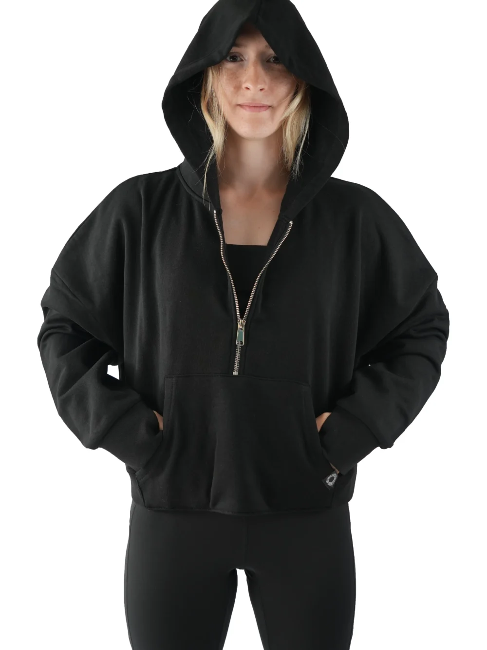 Model wearing the black hoodie with the hood up, demonstrating the coverage of the premium workout gear from the RHSM calisthenics clothing brand.