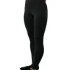 Model wearing the black RHSM Minimalist Leggings, showing the secure high-waist fit.