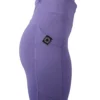 Model in a side profile wearing the lavender RHSM leggings, highlighting the side pocket functionality.