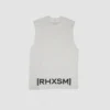The white "[RHXSM]" oversized tank, laid flat (back view), detailing the bold statement back graphic on this piece of calisthenics apparel.