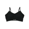 The women's RHSM "[RHXSM]" Seamless Sports Bra in black, laid flat (front view), showing the premium embroidered logo and body-sculpting design of this fitness apparel.