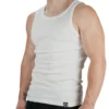 Muscular male model wearing white RHSM Minimalist Ribbed Tank, showing the form-fitting structure and small hem tag for workout gear.