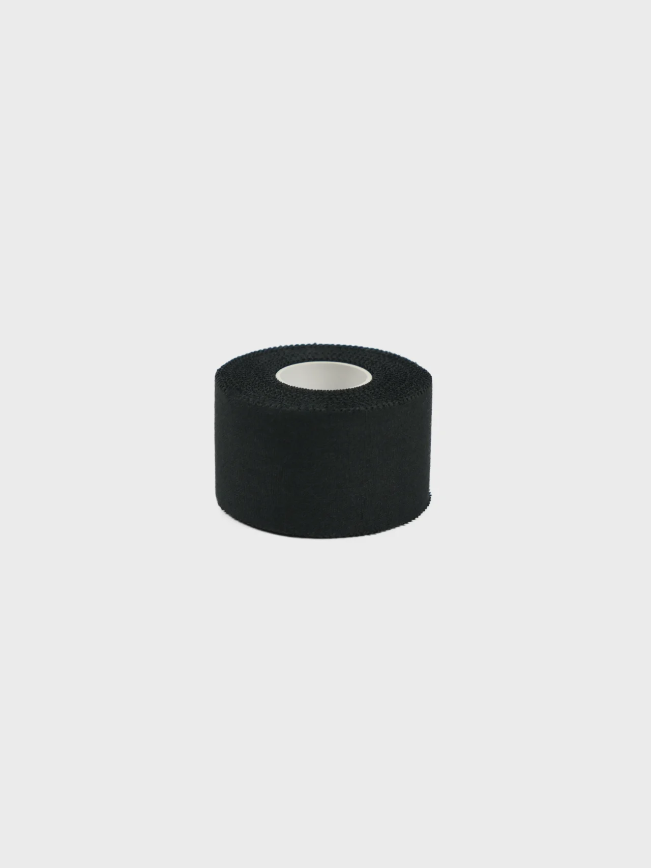 A single roll of stealth black RHSM grip tape for street workout, professional-grade calisthenics apparel hardware.